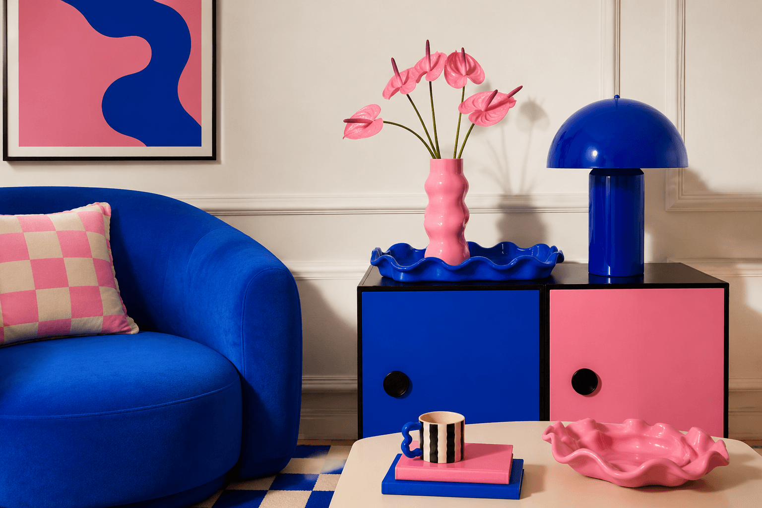 A cobalt and bubblegum colour clash living room with sculptural ordinary homeware accents
